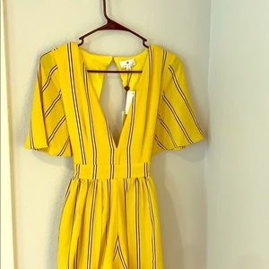 Hi-low flowy, vibrant romper